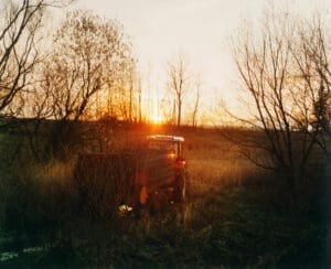 http://Tractor%20in%20field%20at%20sunset,%20golden%20hour%20light,%20golden%20hour,%20tractor,%20farm,%20farm%20machinery,%20rural,%20europe,