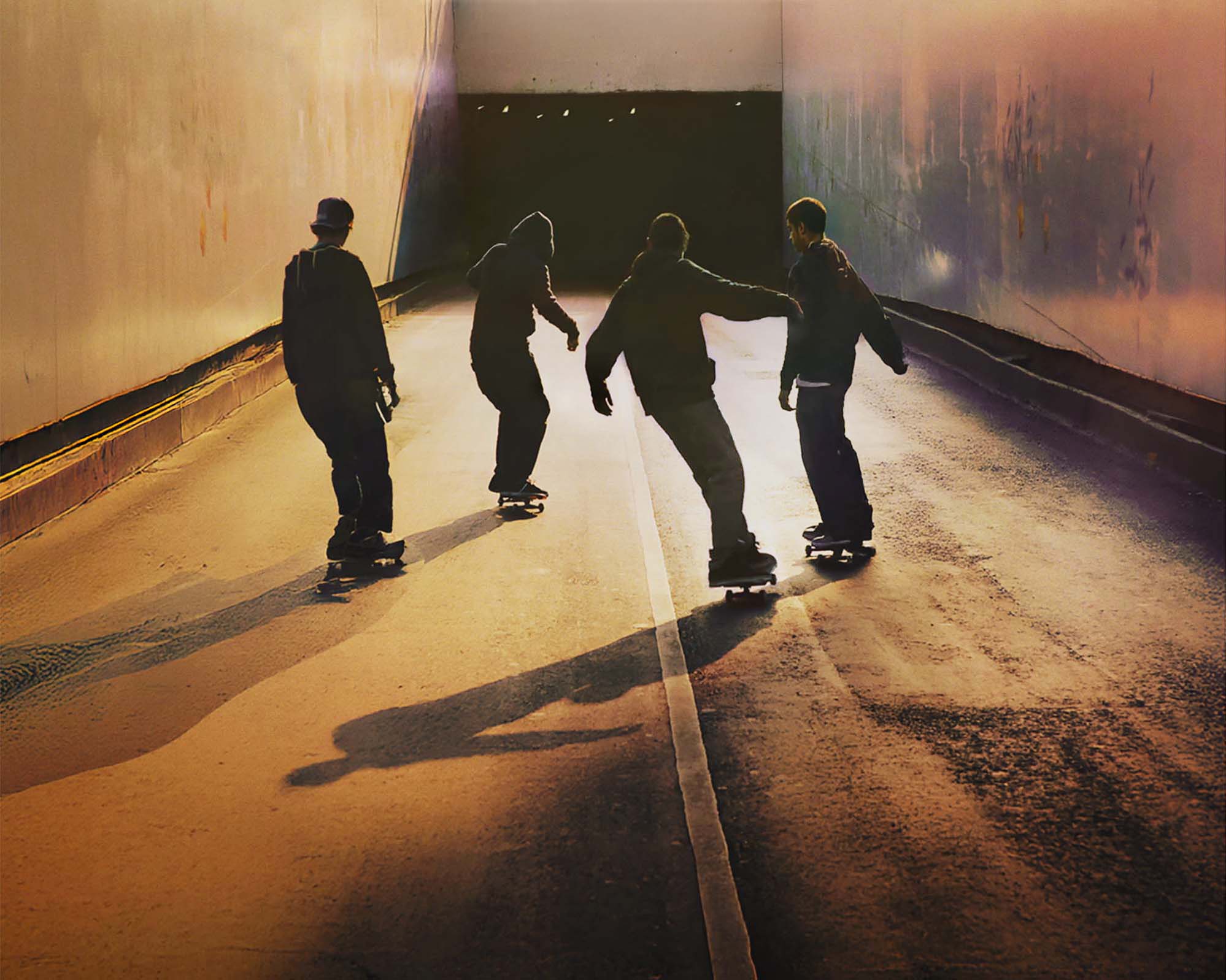 http://Group%20of%20skate%20boarders,%20skaters%20entering%20a%20tunnel,%20on%20road,%20tunnel,%20motorway,%20mexico%20city