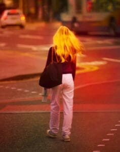 http://Evocative%20street%20portrait%20with%20golden%20light%20on%20a%20woman's%20hair%20on%20streets%20of%20Manchester%20by%20British%20photographer%20Ben%20Stockley.